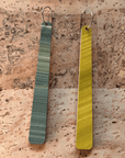 Angelco Accessories reversible paddle paper earrings - showing the colour on each side - gold or khaki