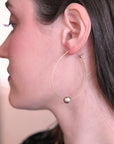 Angelco Accessories Floating pearl hoop earrings - close up as worn by model