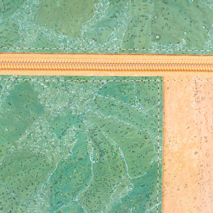 Angelco Accessories Katt crossbody bag showing a close up of the green metallic marbled panelling