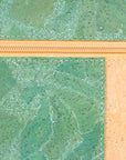 Angelco Accessories Katt crossbody bag showing a close up of the green metallic marbled panelling