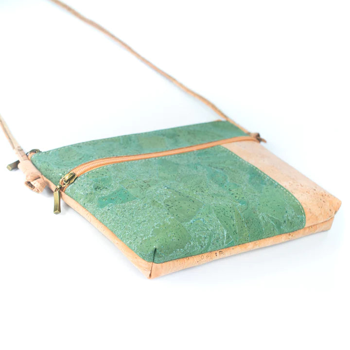 Angelco Accessories Katt crossbody bag with green metallic marbled panelling on white flatlay angled view