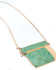Angelco Accessories Katt crossbody bag with green metallic marbled panelling on a white background with strap extended