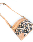 Angelco Accessories Pippa cork handbag - diamond style laying on white background with strap extended