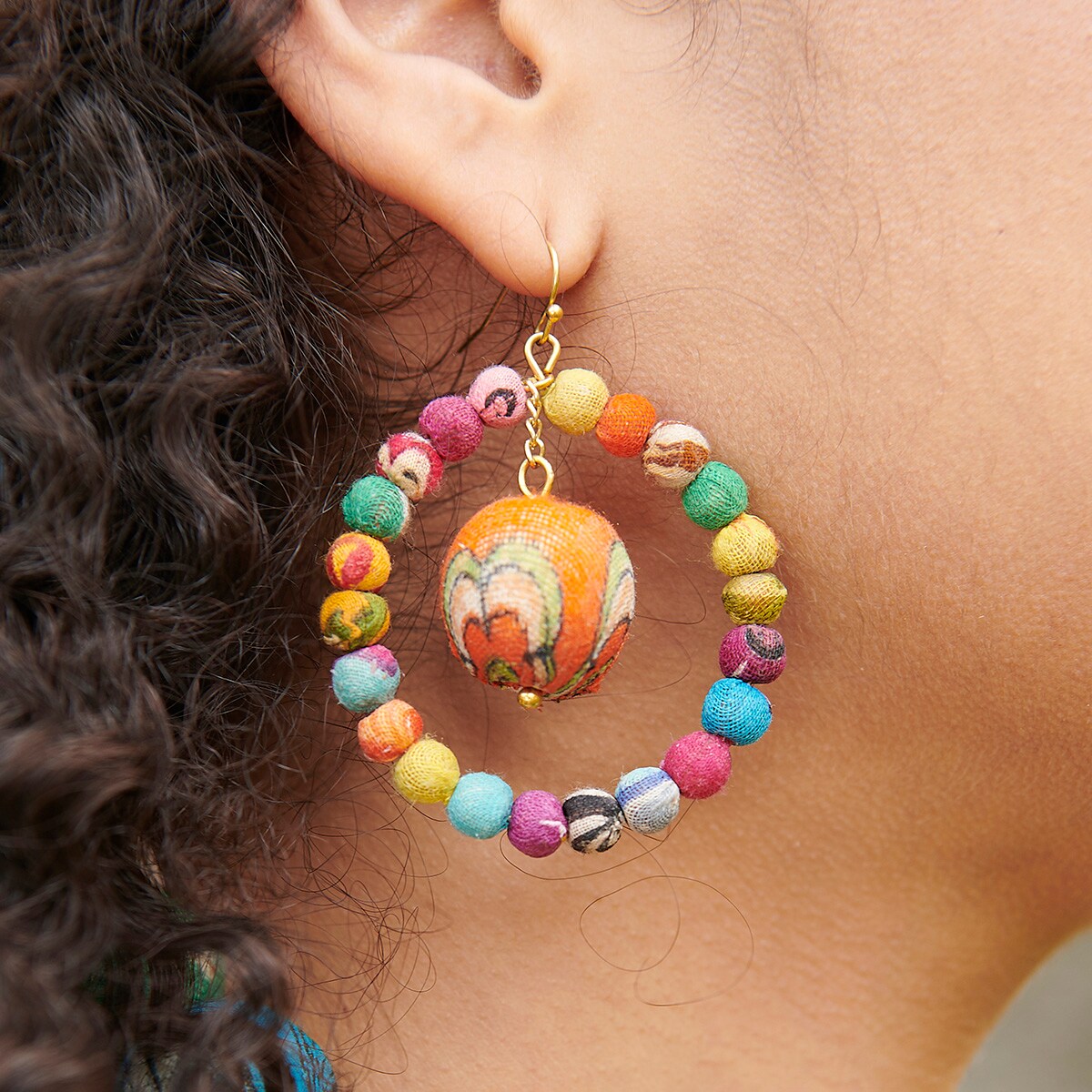 Soleil kantha hoop earrings as worn by model close up view