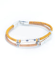 Angelco Accessories Straight lines cork bracelet in yellow, angled view on white flatlay