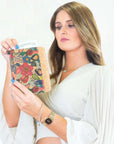 Angelco Accessories Printed mid size cork wallet being held by model