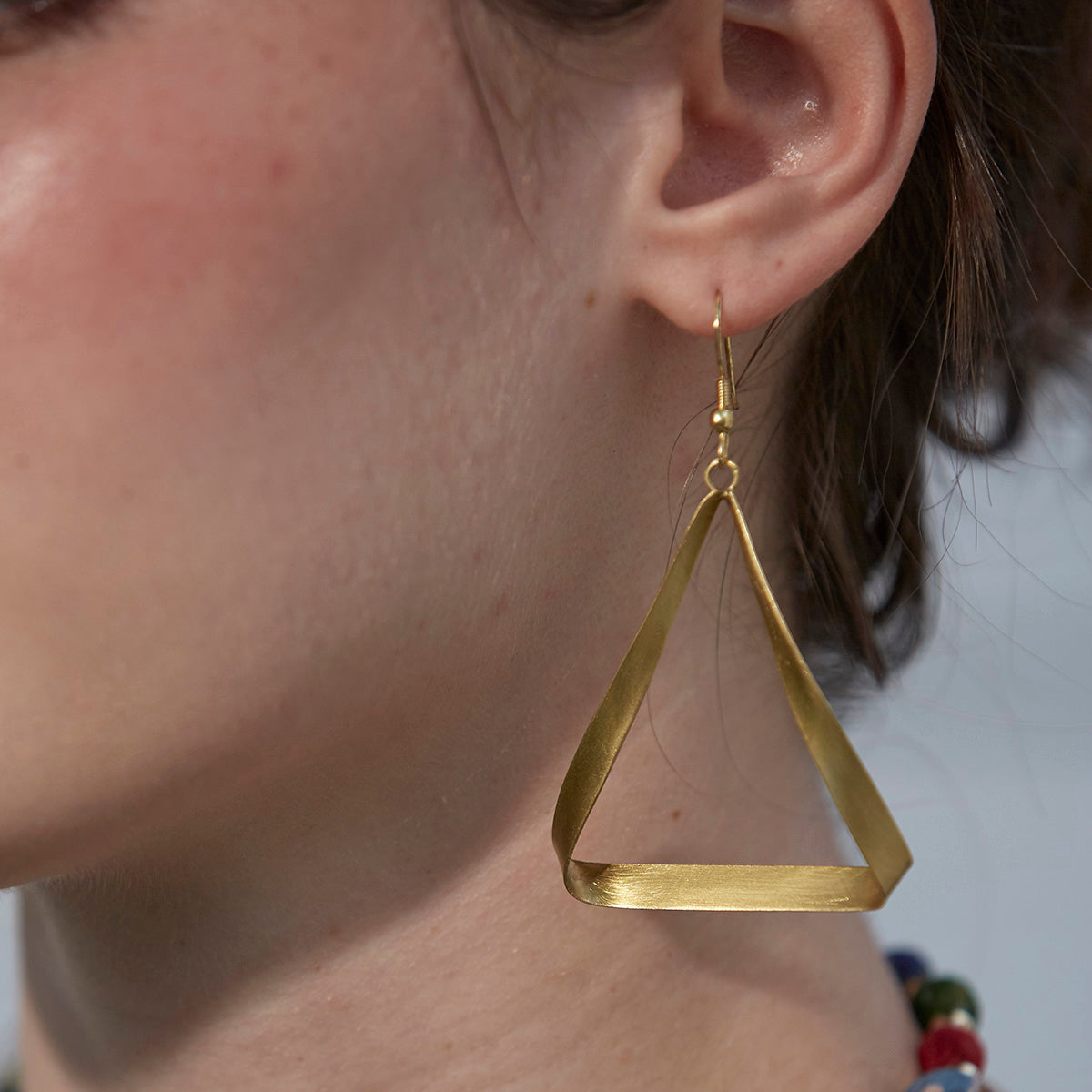 Accessories Brass ribbon triangle earrings