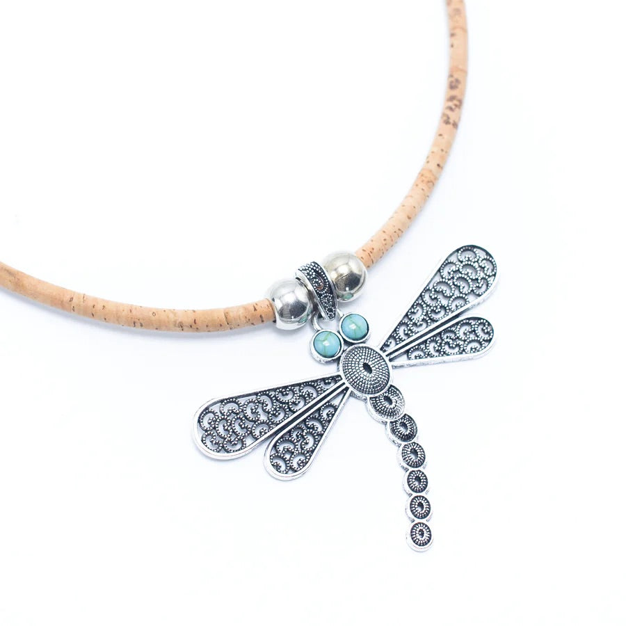 Angelco Accessories Turquoise dragonfly pendant cork necklace - close up on white flatlay