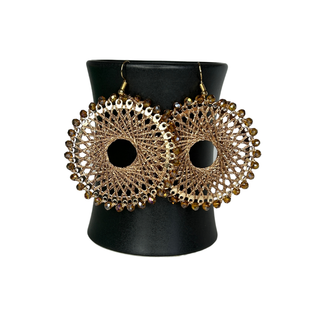 Angelco Accessories Colour burst circle earrings hanging on ceramic cup on white background - gold