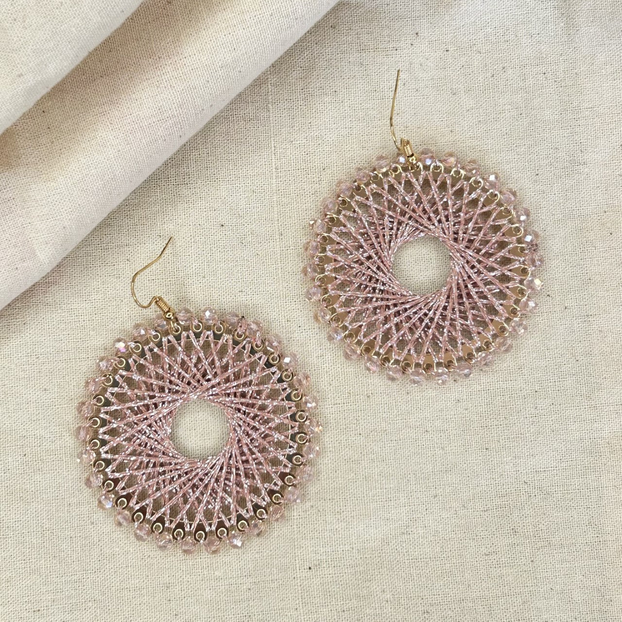 Angelco Accessories Colour burst circle earrings on linen background - rose