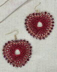 Angelco Accessories Colour burst heart earrings on linen background - red