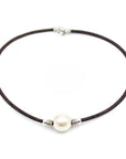 Angelco Accessories large solitaire pearl cork necklace