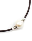 Angelco Accessories large solitaire pearl cork necklace