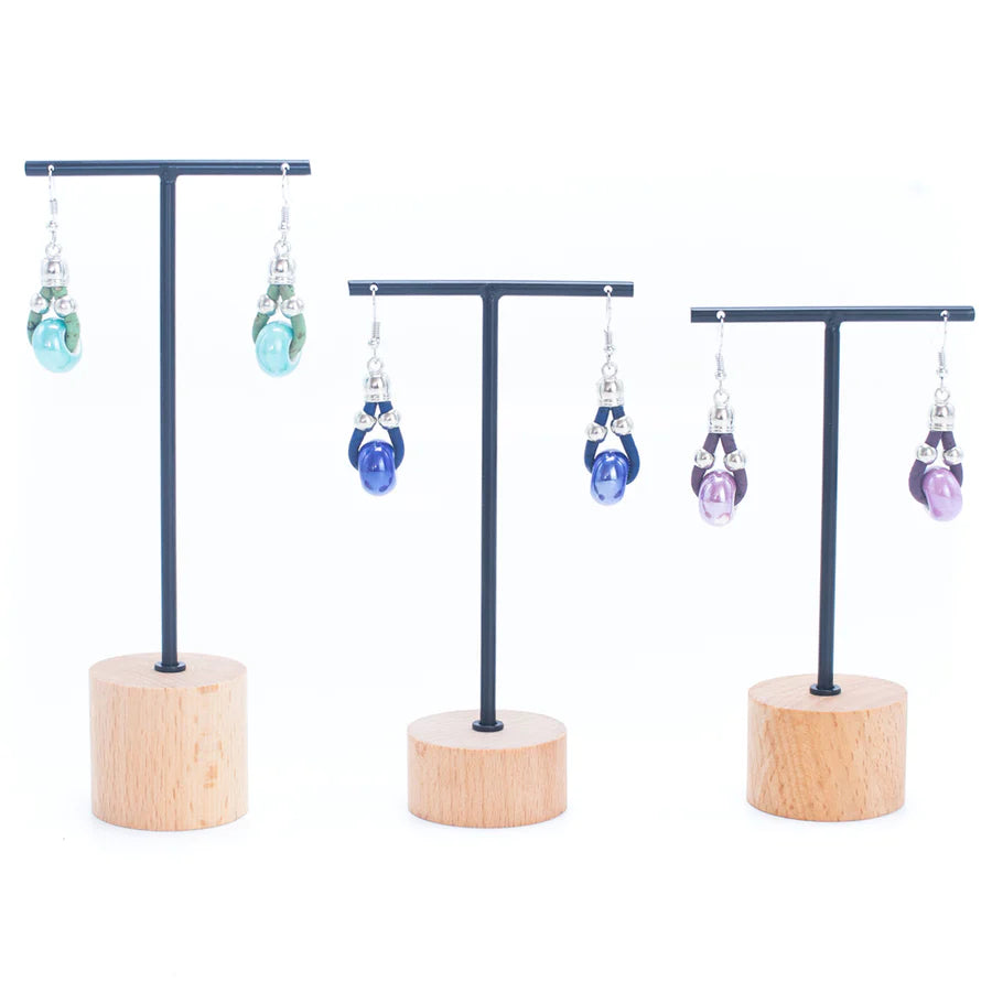 Angelco Accessories Ceramic bead cork drop earrings in green, blue and purple, presented on stands