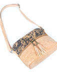 Angelco Accessories Millie cork handbag - style A laying on white background with shoulder strap extended