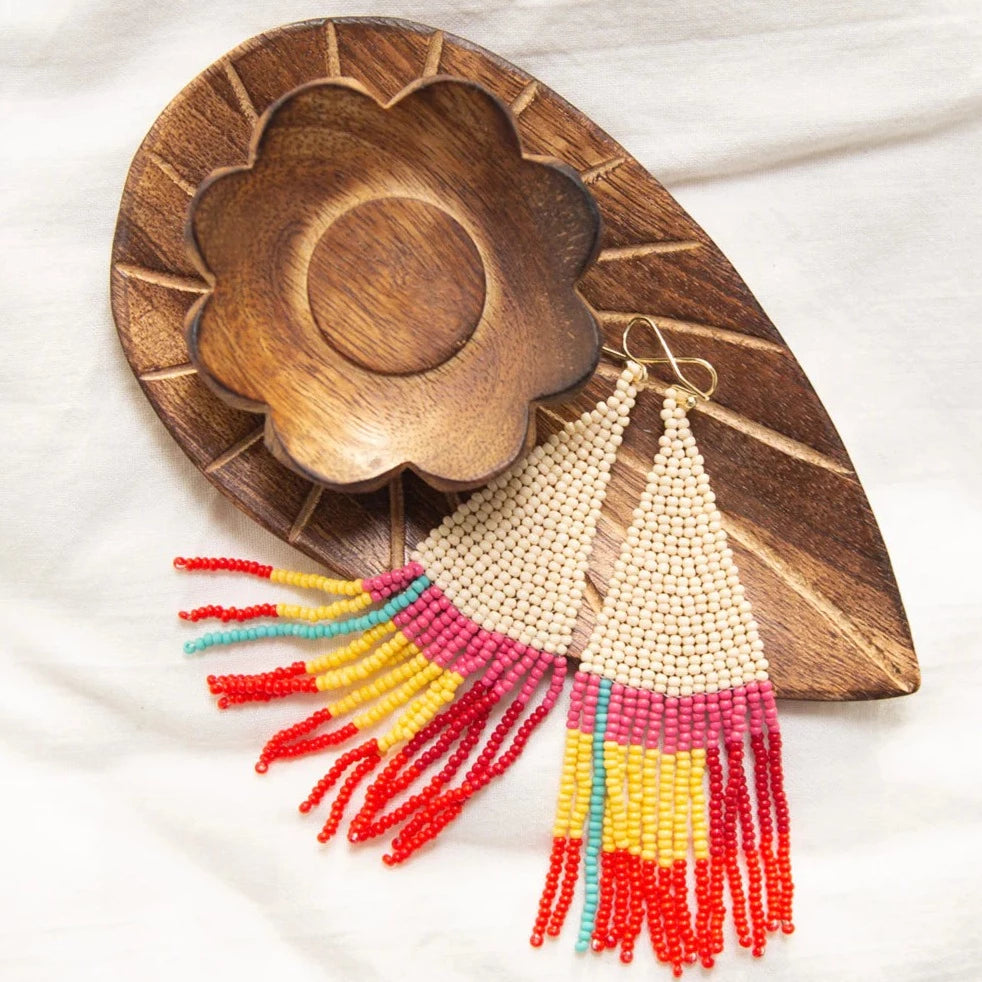 Angelco Accessories - Tri-tassel earrings - laid on wooden bowl and white cloth