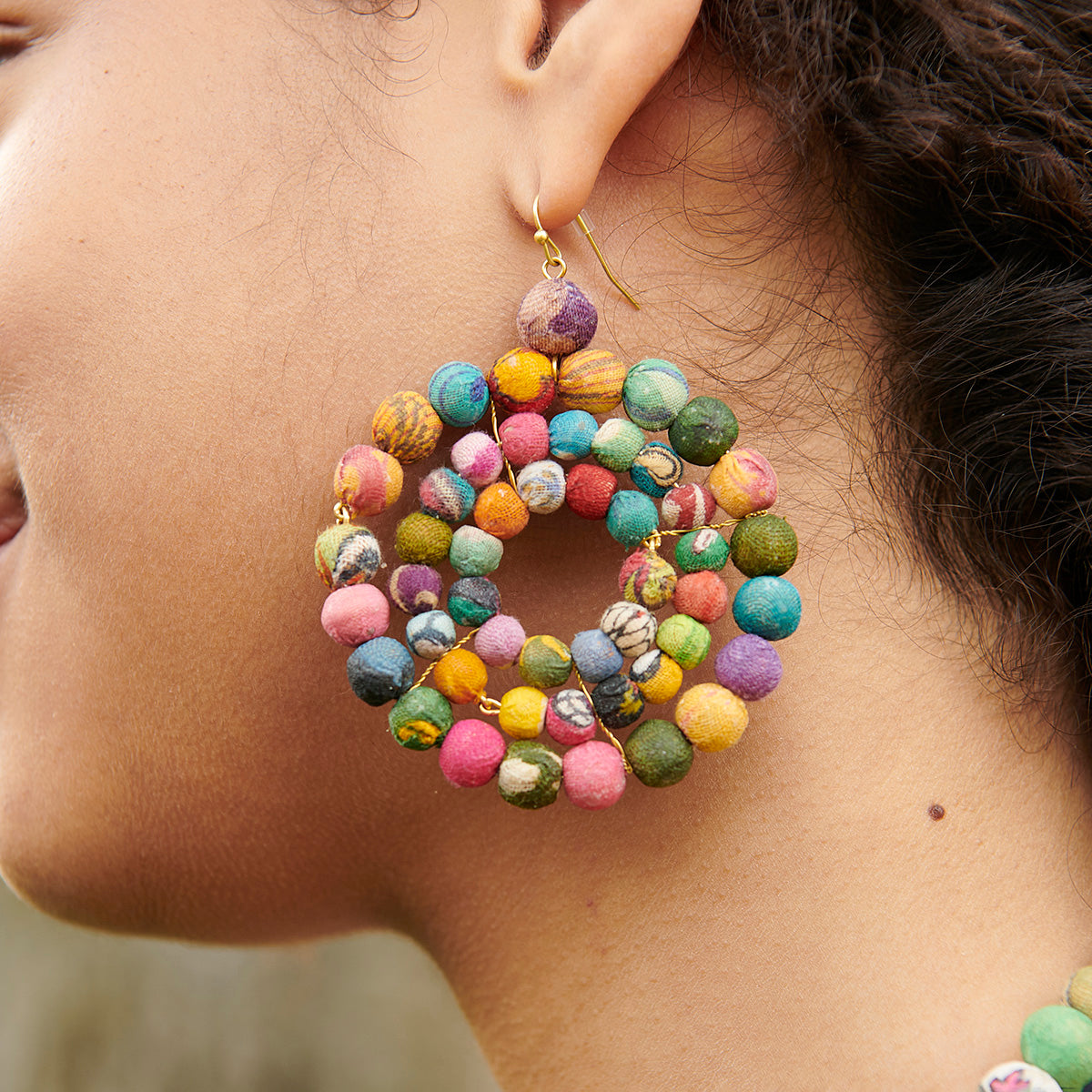 Angelco Accessories concentric kantha earrings as worn by model in close up view