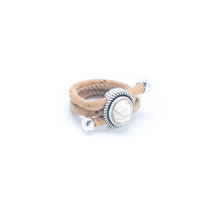 Angelco Accessories Oval stone cork ring - angled view of white ring