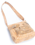 Angelco Accessories Josie cork handbag on white flatlay with shoulder strap extended