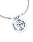 Angelco Accessories Swirl Cork Necklace - pendant close up on white flatlay