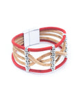 Angelco Accessories twisted lines cork bracelet in red - angled view on white background