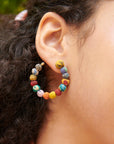 Angelco Accessories flatlay kantha hoop earrings  - close up worn by model