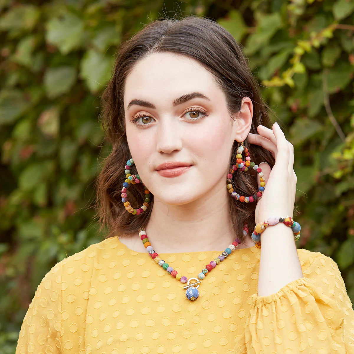 Angelco Accessories kantha toggle necklace worn by model with kantha earrings and bracelet
