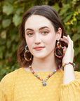 Angelco Accessories kantha toggle necklace worn by model with kantha earrings and bracelet