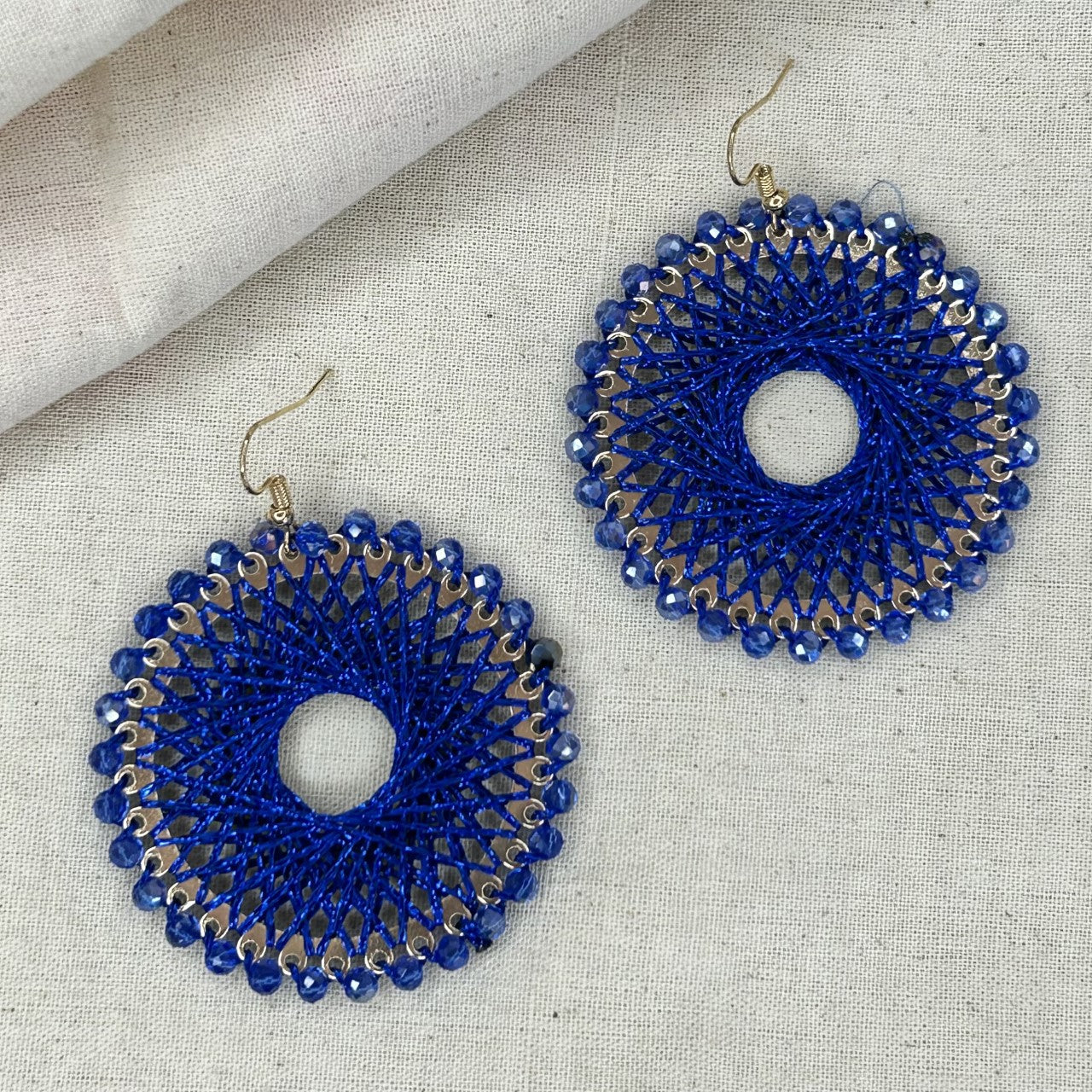 Angelco Accessories Colour burst circle earrings on linen background - cobalt