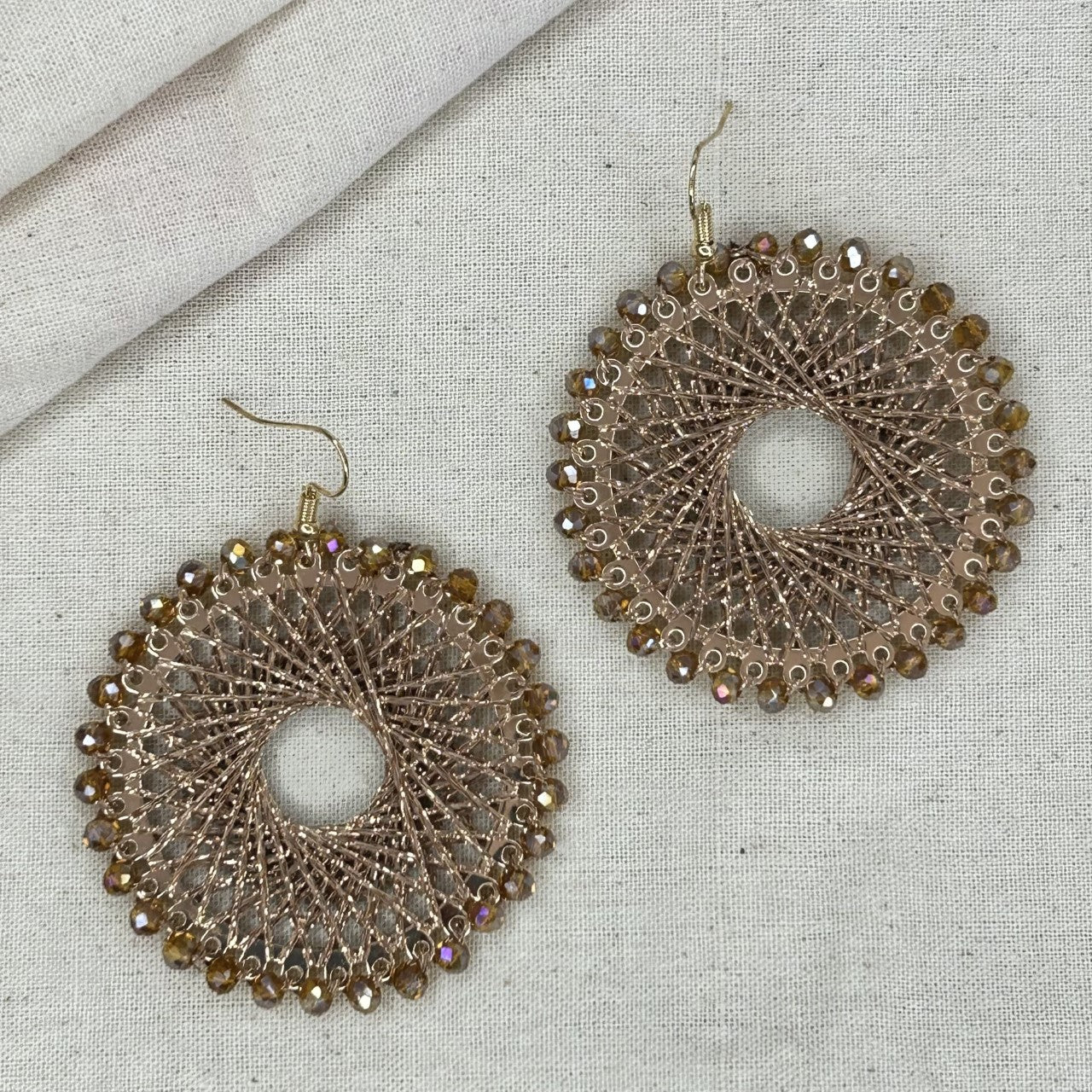 Angelco Accessories Colour burst circle earrings on linen background - gold