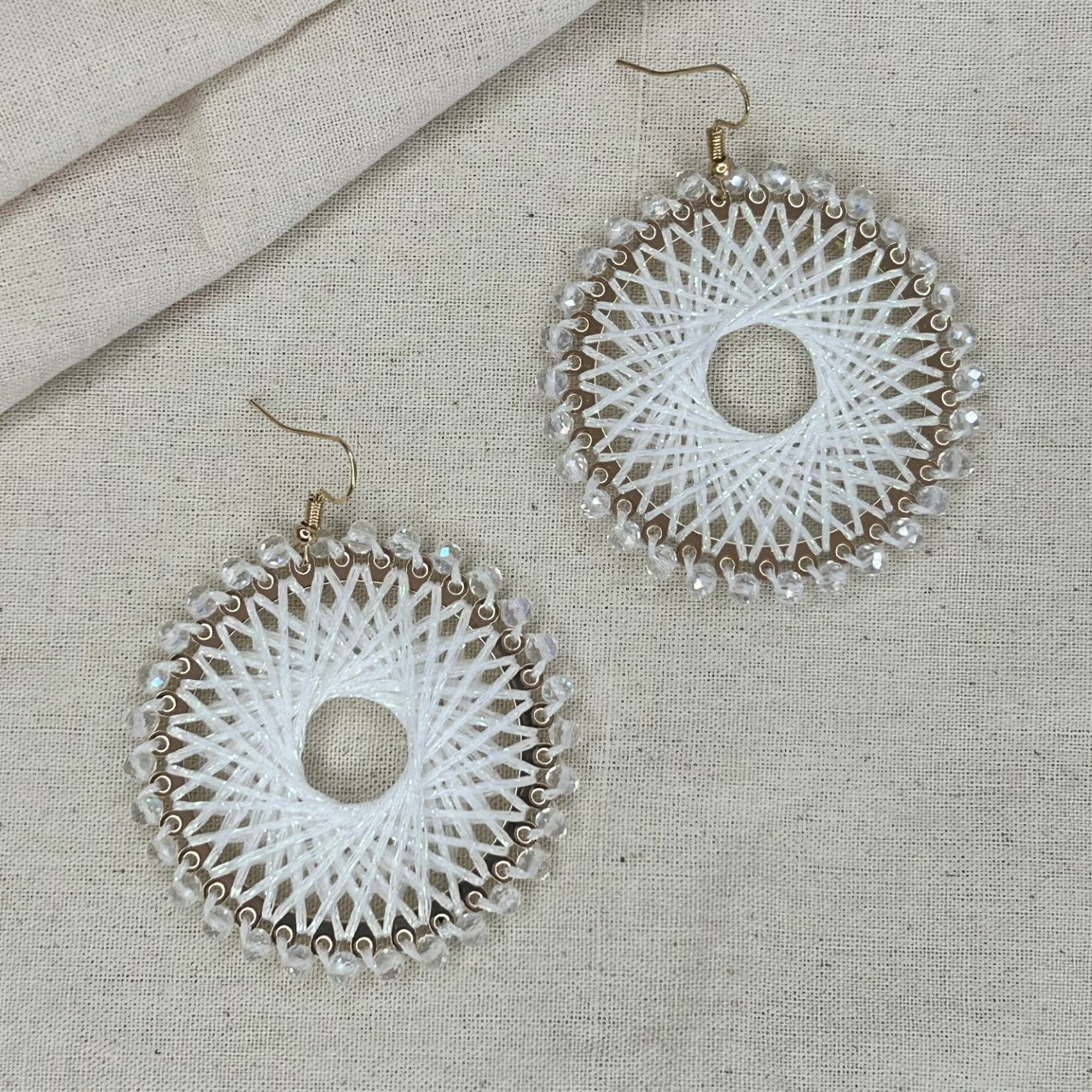 Angelco Accessories Colour burst circle earrings on linen background - white