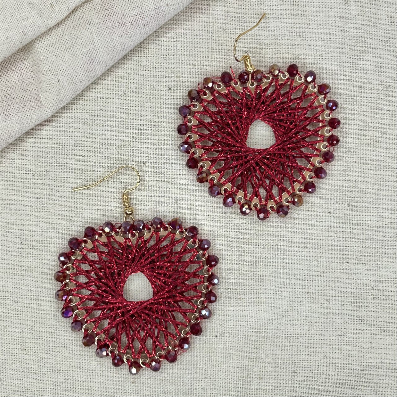 Angelco Accessories Colour burst heart earrings on linen background - red