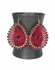 Angelco Accessories Colour burst teardrop earrings hanging on ceramic cup on white background - red