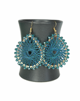 Angelco Accessories Colour burst teardrop earrings hanging on ceramic cup on white background - teal
