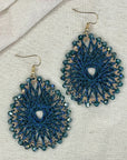 Angelco Accessories Colour burst teardrop earrings on linen background - teal