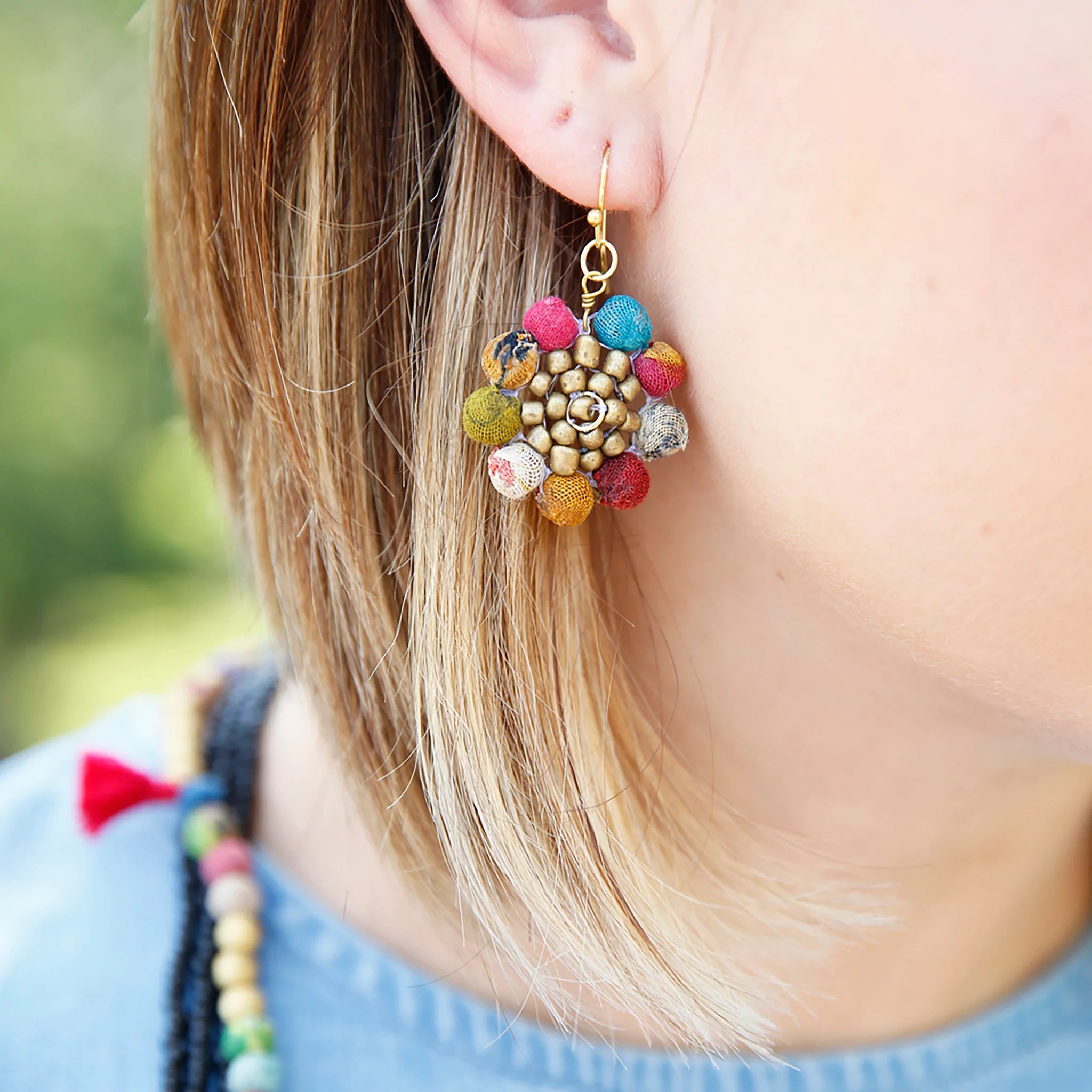 Angelco Accessories Sunny flower kantha earrings - close up worn on ear